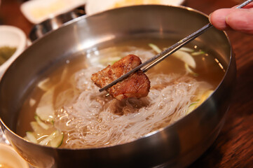 Korean cold noodles in chilled broth