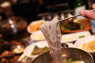 Korean cold noodles in chilled broth