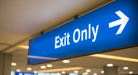 Illuminated Exit Sign Directing Passengers, Clear Blue Signage and Arrow Indicator
