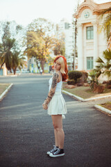 young woman walking on the street