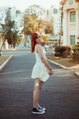young woman walking on the street
