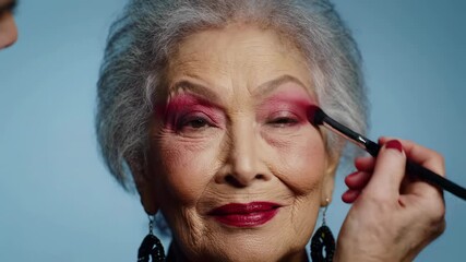 Bright makeup transformation for an elderly woman showcases artistry and vibrancy in beauty