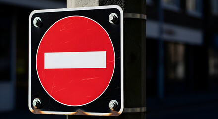 Prohibition Signage: A Symbol of Restrictions and Rules Displayed Publicly on a Pole