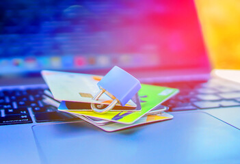 Secure Online Payments With Lock, Credit Cards,Laptop Keyboard. Lock, credit cards as security online transactions. Theft of funds bank cards. Online banking theft. Cybersecurity, cyber fraud.