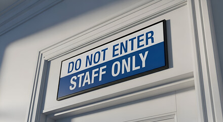 Signage Indicates Staff Access Only For Restricted Areas In A Professional Environment