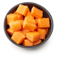 sliced carrot in black bowl isolated on white background. clipping path