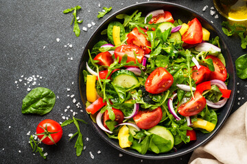 Fresh salad with leaves and vegetables.