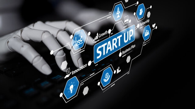 A robot hand typing on a keyboard symbolizes the integration of technology in business, showcasing concepts of innovation and startup growth in a digital environment. Tessel