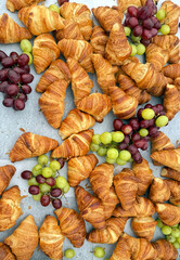 A table full of breakfast croissants