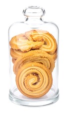 Stack of spiral cookies under a glass cloche, white background