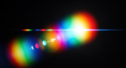 Abstract rainbow light flare and lens reflection on a dark black background, colorful prism spectrum bokeh effect, glowing circular refractions, soft gradient halos of red, orange, yellow, green, blue