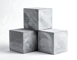 Stacked gray concrete cubes with marbled surface, isolated on white background