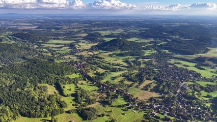 Stunning Aerial View Showcasing Lush Green Fields and Gently Rolling Hills in Natures Beauty