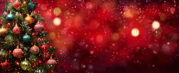 Vibrant Christmas tree adorned with colorful ornaments and twinkling lights against a sparkling red bokeh background with falling snow.