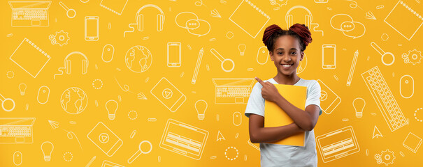 A joyful child stands in front of a vibrant yellow background filled with school-related icons. She holds a folder and points, showing her enthusiasm for learning and education.