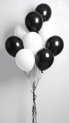 Monochrome photo a cluster of black and white inflated balloons