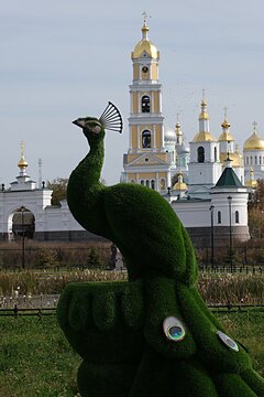 A fusion of art and spirituality: in the picturesque Diveyevo Monastery, Russia, against the backdrop of majestic Orthodox church domes, stands an exquisite art object &ndash; a topiary peacock. This unique