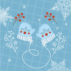 Blue winter-themed background with knitted hats, berries, and snowflakes, perfect for holiday designs and cold season projects