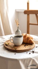 Morning coffee and croissant on a round wooden tray