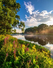 Morning view of a river, with colorful flowers in foreground