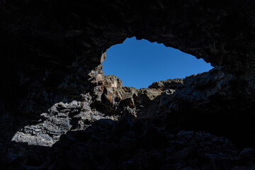 Lava tube. Indian Tunnel. Basalt Lava Flows. Caves Trail, Craters of the Moon National Monument & Preserve. Volcanic Field. Idaho's eastern Snake River Plain.  © youli zhao