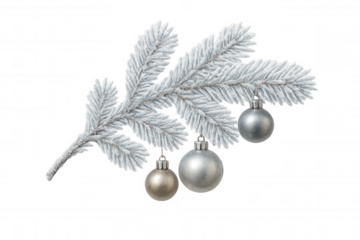 Flocked fir branch with silver and gold christmas baubles, hanging ornaments, winter holiday decoration