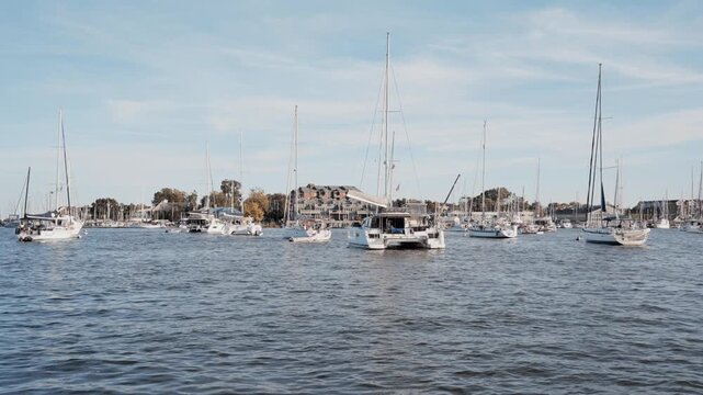 Boats in marina of Downtown Annapolis, Maryland with city