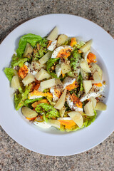 Mixed salad on a white plate