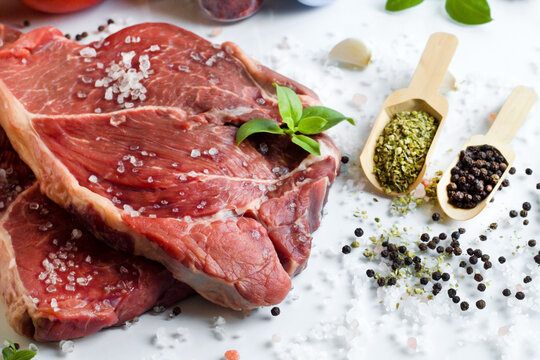 Designed with two pieces of raw beef, black pepper, thyme, garlic and rock salt - Powered by Adobe