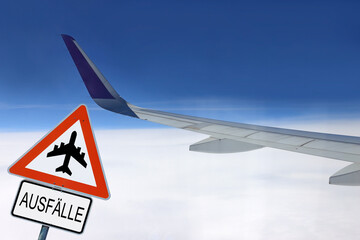 Flugzeug und Schild Ausfälle im Flugverkehr
