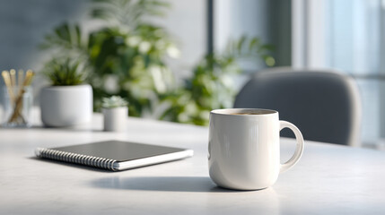 White ceramic mug filled with hot coffee on a modern office desk with a spiral notebook and lush green plants in the background enjoying natural sunlight ambiance