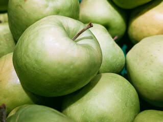 close-up of fresh organic granny smith green apples pile