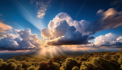 majestic cumulus clouds with dramatic sunlight breaking through creating beautiful sky light and shadow