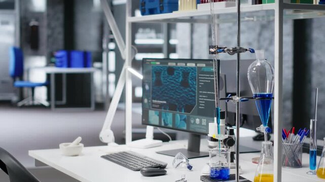 Laboratory desk used for molecular results in empty research facility, high tech tools and modern equipment for microbiology and biotechnology experiments. Advanced clinical testing.