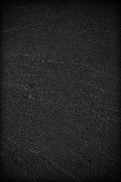 Dark grey black slate background or texture.