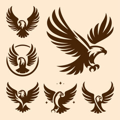 Silhouette logos of eagles in various poses