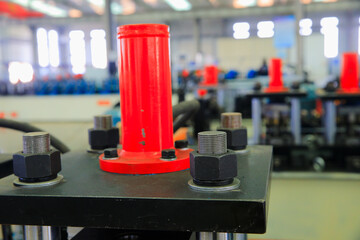 The bolts and nuts on the industrial equipment