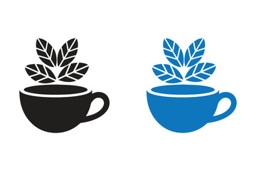 Holiday Coffee Cup Vector art of two stylized cups of tea, one black and one blue, with green leaves emerging from the top