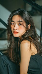 Subtle Glance: A captivating portrait of a young woman with long, flowing hair, her eyes reflect a sense of introspection and grace. A moment of quiet beauty captured with gentle light and shadow.