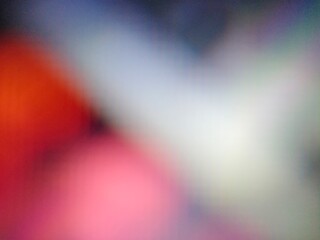 A vibrant blur of colors creating a dynamic and abstract backdrop for various creative projects.