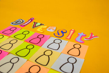 Vibrant Diversity Concept With Colorful Cutout Letters And Sticky Notes On Yellow Background