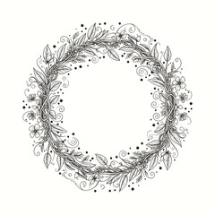 A detailed, hand-drawn black and white floral wreath illustration with leaves, vines, flowers, and swirls