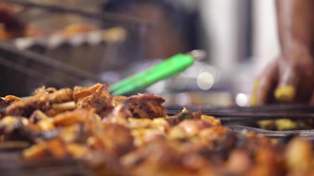 Closeup shot of cooking chicken tikka. Delicious Smoked chicken.
