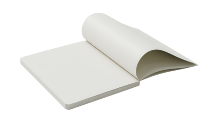 Blank white paper notepad with one page turned open against a stark black background