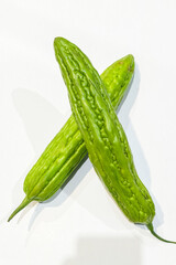 Bitter melon (Peria) White vegetable background