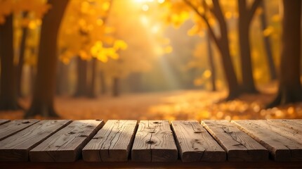 Warm golden sunlight filters through vibrant autumn trees, casting a magical glow over a rustic wooden table, perfect for seasonal displays and cozy scenes.