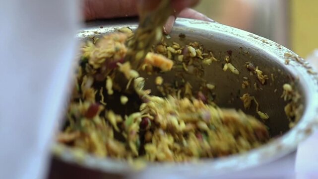 Spicy Indian snack Bhel puri. Quick Indian street food.