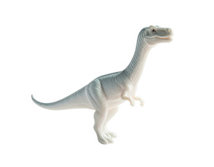 A light grey plastic dinosaur figurine on a stark black background