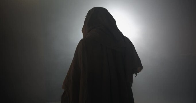 Resurrection of Jesus Christ in Bright Ambient Light in Empty Tomb on Easter Sunday for cinematic Christianity stock footage.