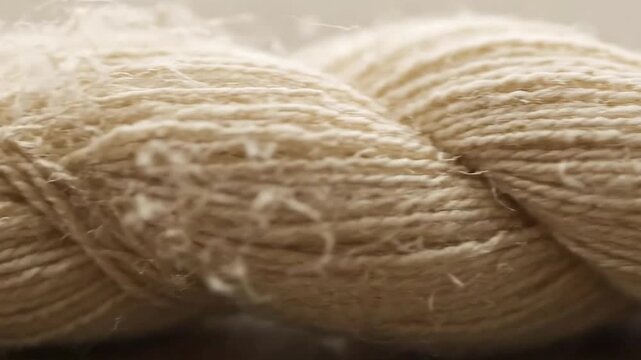 Braided Natural Fiber Rope Close Up Showing Texture and Detail in Soft Lighting perfect for nautical themes, construction, or manufacturing processes around ropes and textiles production